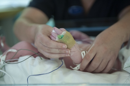 newborn getting medical care