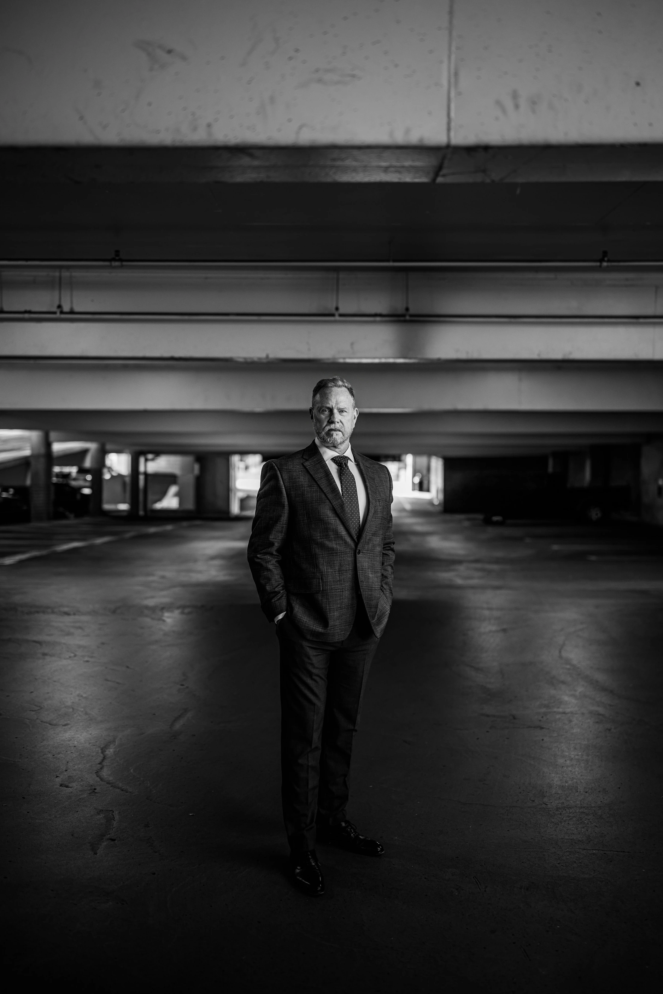 Patrick Angel standing in a parking garage.